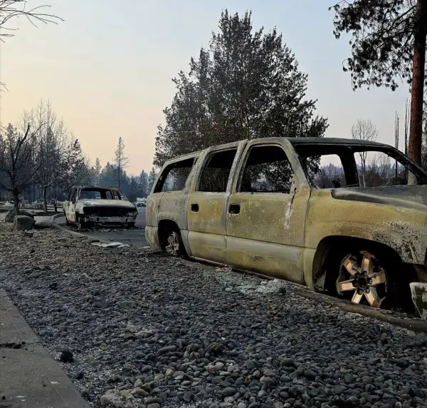 Both burned where they were parked. The aluminium wheels melted and the glass is on the ground.